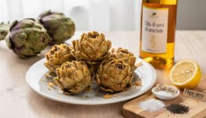 Carciofi alla giudia: la tecnica per una frittura croccante secondo la tradizione romana